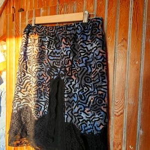 Coach skirt gently worn. Black and blue with pink. Length just above the knee.